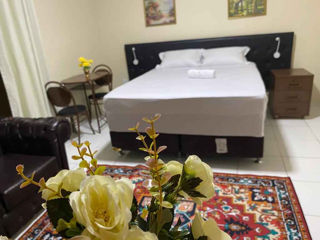Cama da Suíte Cedro com Varanda do Bertolini Hotel